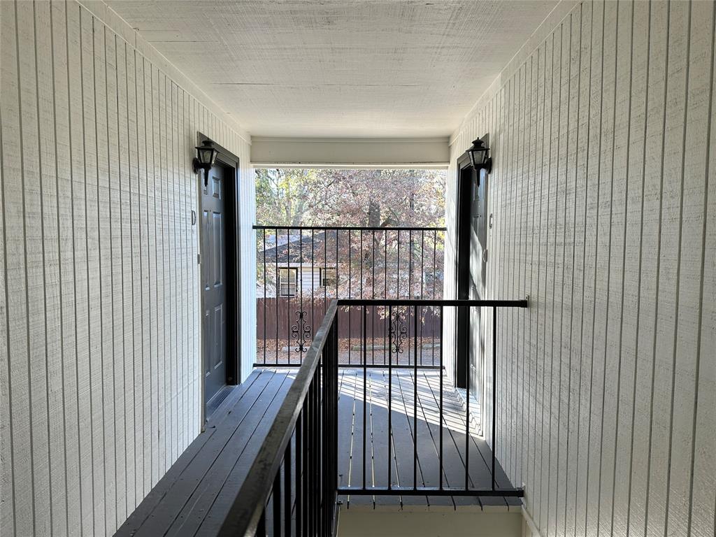2006 Jane Street, Unit D Longview, TX 75601 - Photo 8 of 12 a view of staircase with wooden floor