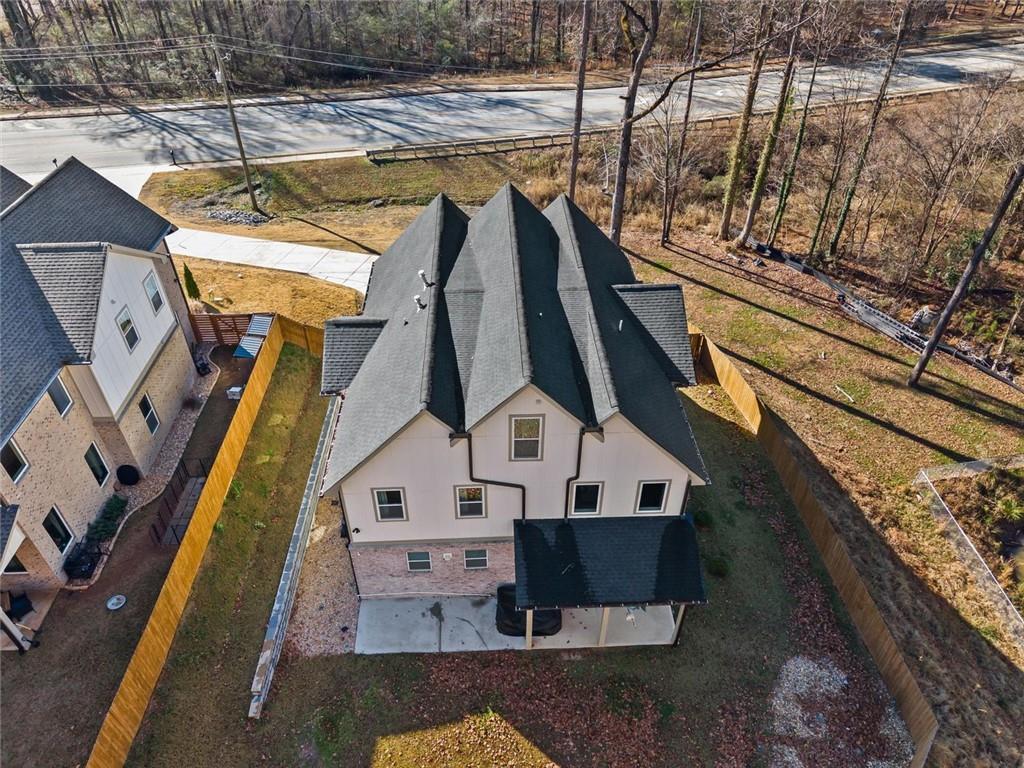 658 Rockbridge Road Northwest Lilburn, GA 30047 - Photo 54 of 61 a view of a house with a park