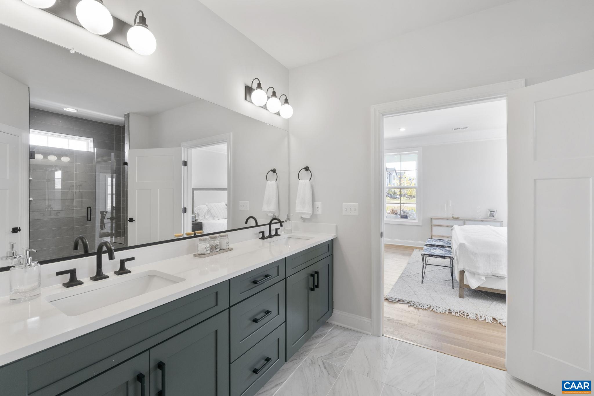 109 Marcella Street Charlottesville, VA 22911 - Photo 28 of 49 a spacious bathroom with a double vanity sink mirror and double