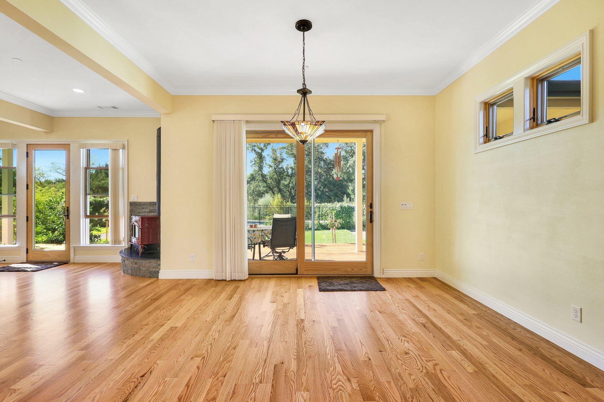 3211 Lake Redding Drive Redding, CA 96003 - Photo 12 of 68 a view of empty room with wooden floor and fan