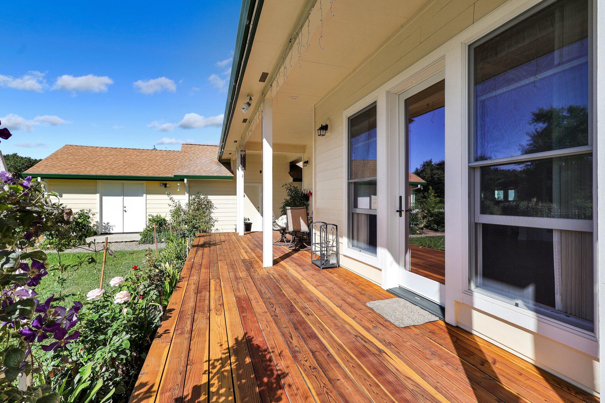 3211 Lake Redding Drive Redding, CA 96003 - Photo 35 of 68 a view of a backyard with plants and patio