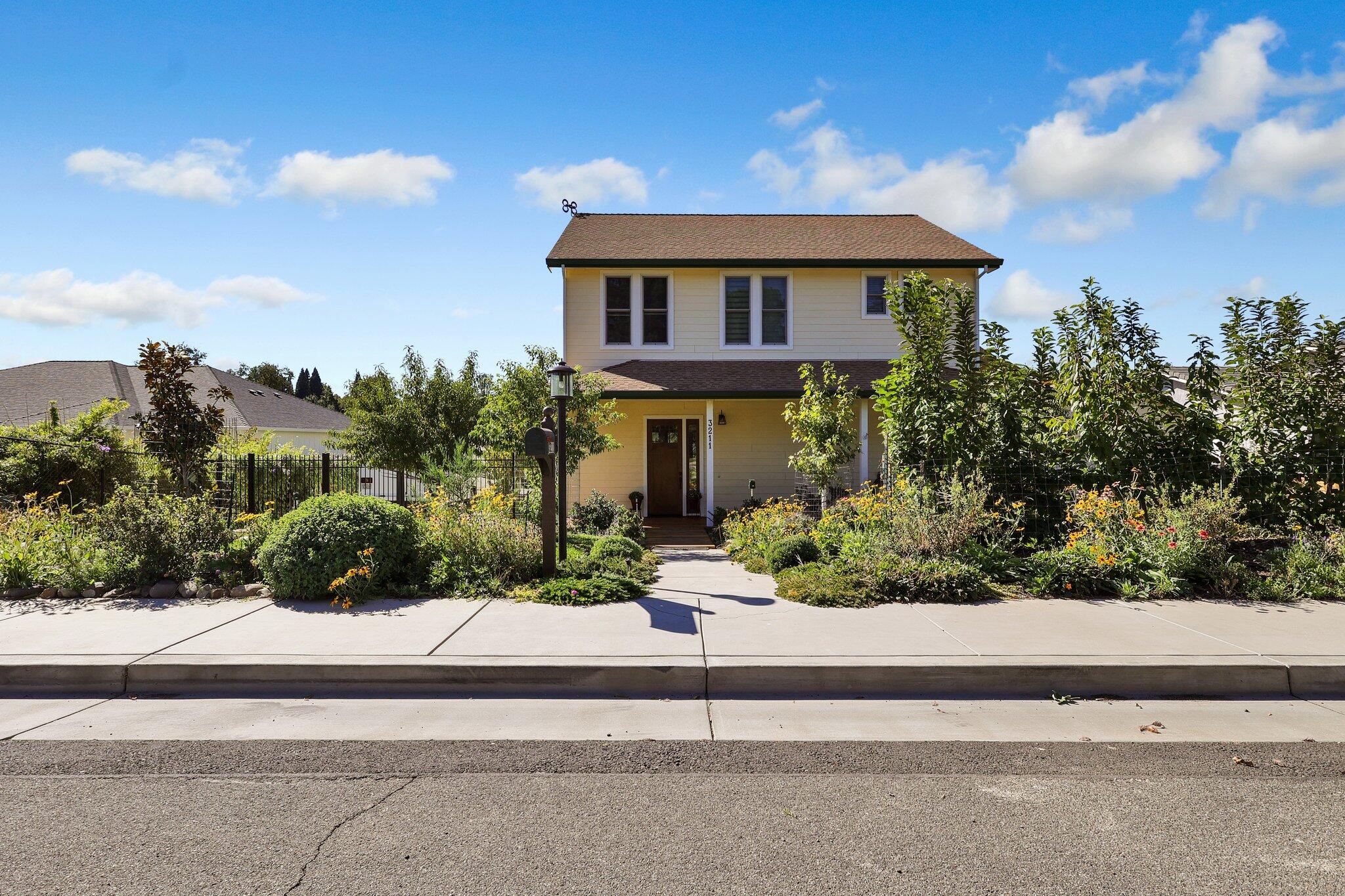 3211 Lake Redding Drive Redding, CA 96003 - Photo 53 of 68 a front view of a house with a yard