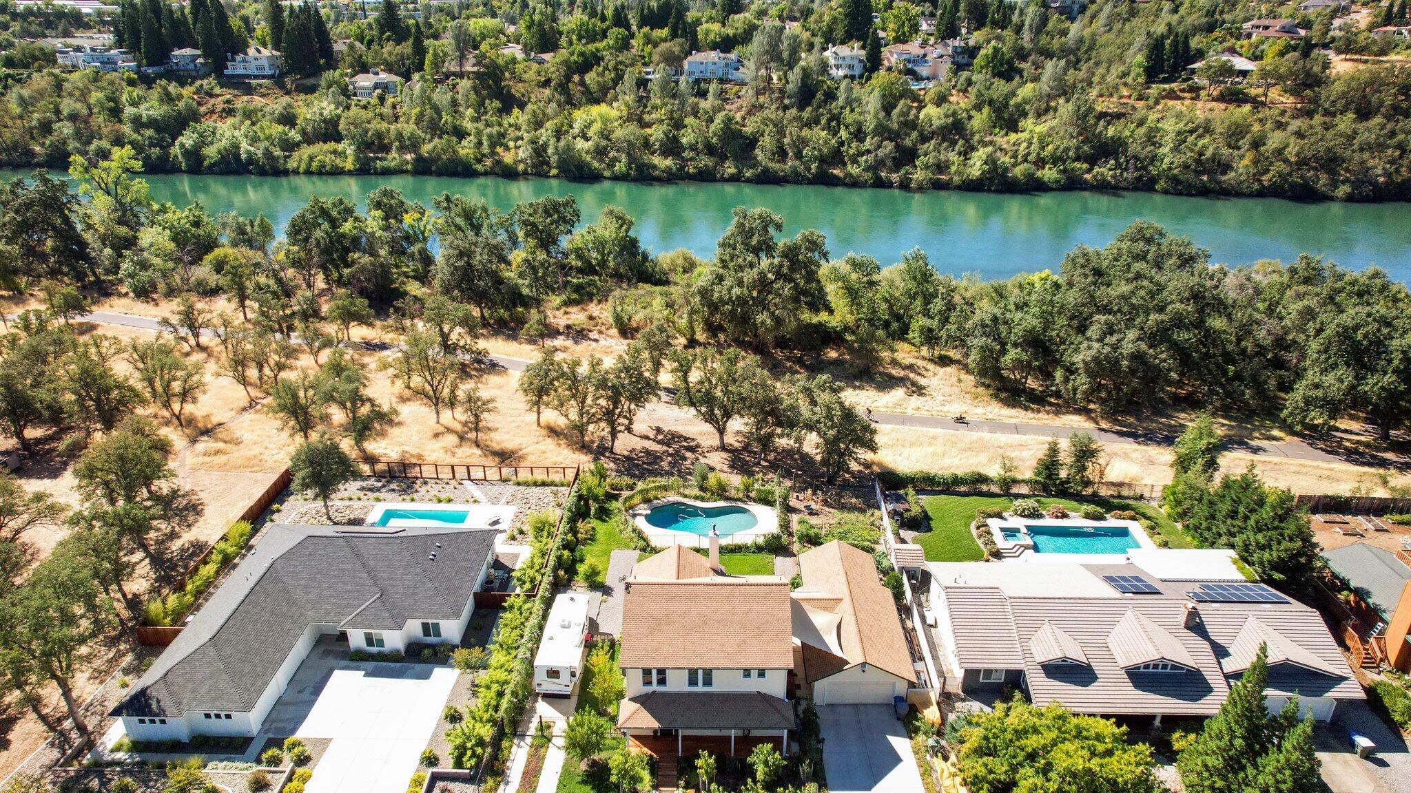 3211 Lake Redding Drive Redding, CA 96003 - Photo 56 of 68 an aerial view of a house with a lake view