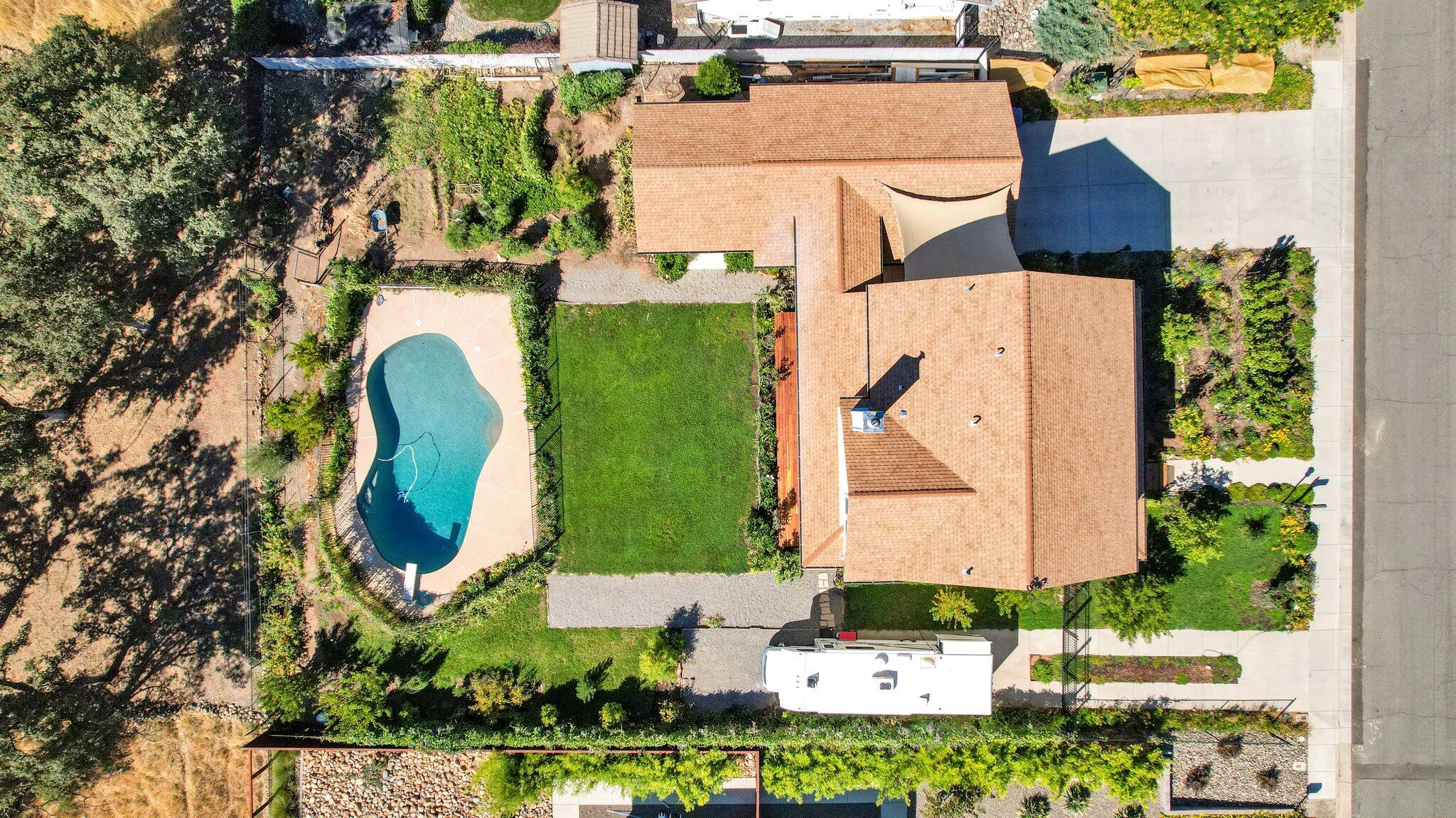 3211 Lake Redding Drive Redding, CA 96003 - Photo 59 of 68 an aerial view of a house with a yard and outdoor seating