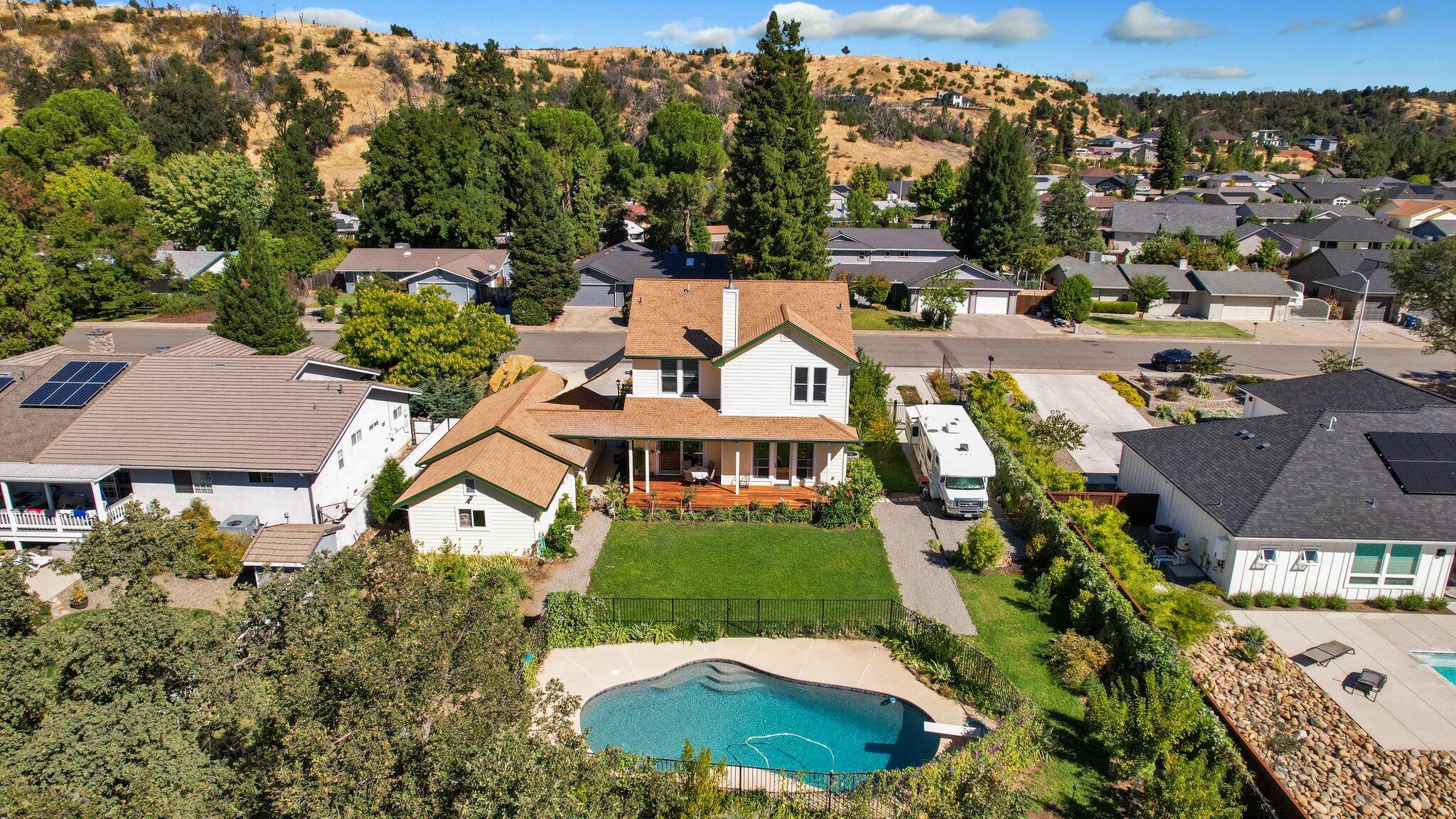 3211 Lake Redding Drive Redding, CA 96003 - Photo 64 of 68 an aerial view of residential houses with outdoor space and trees