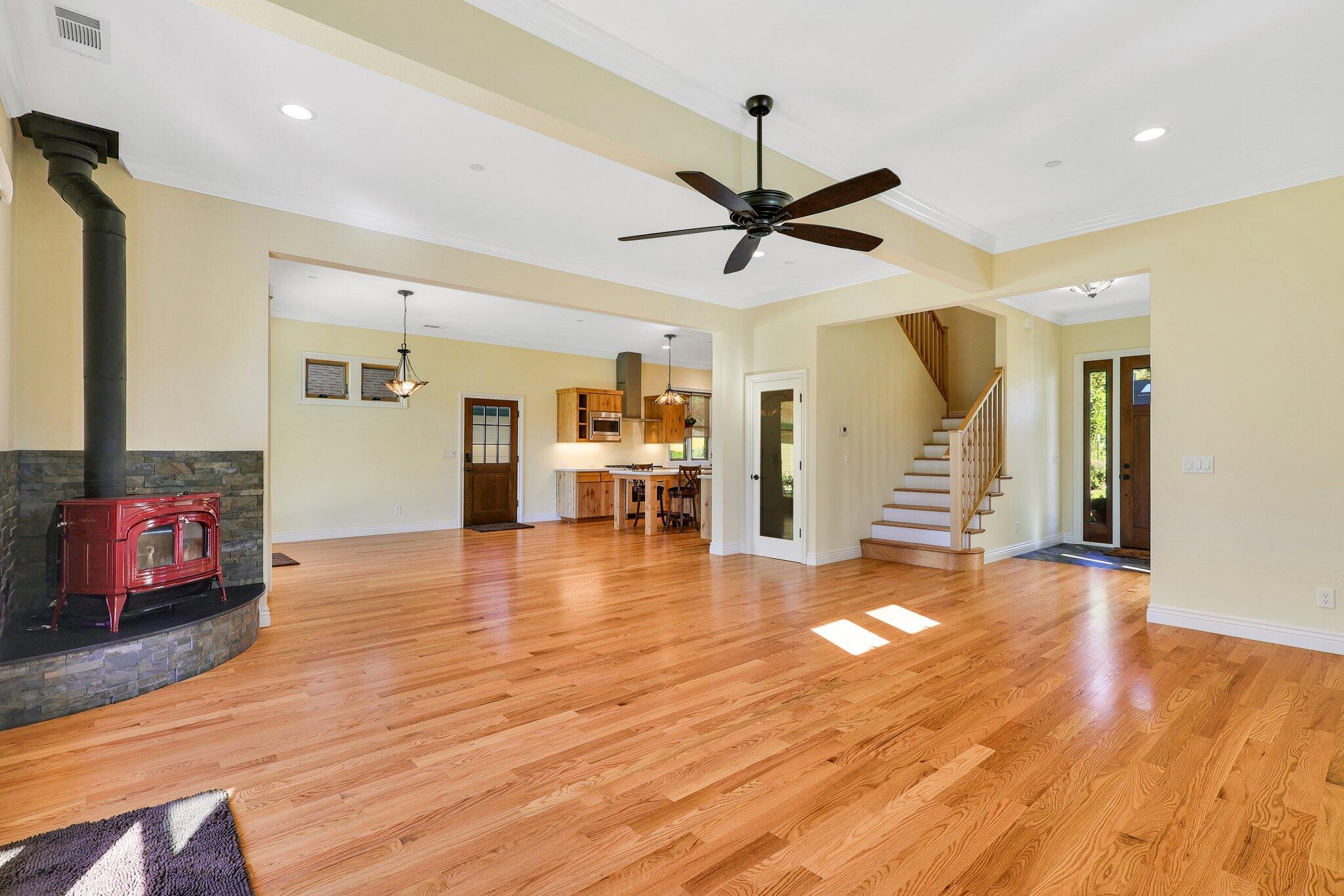 3211 Lake Redding Drive Redding, CA 96003 - Photo 8 of 68 a view of a livingroom with furniture and a ceiling fan