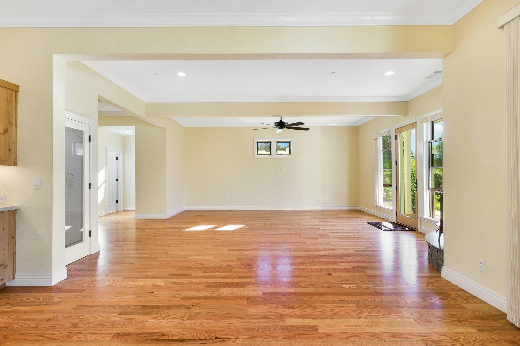 3211 Lake Redding Drive Redding, CA 96003 - Photo 10 of 68 a view of an empty room with wooden floor
