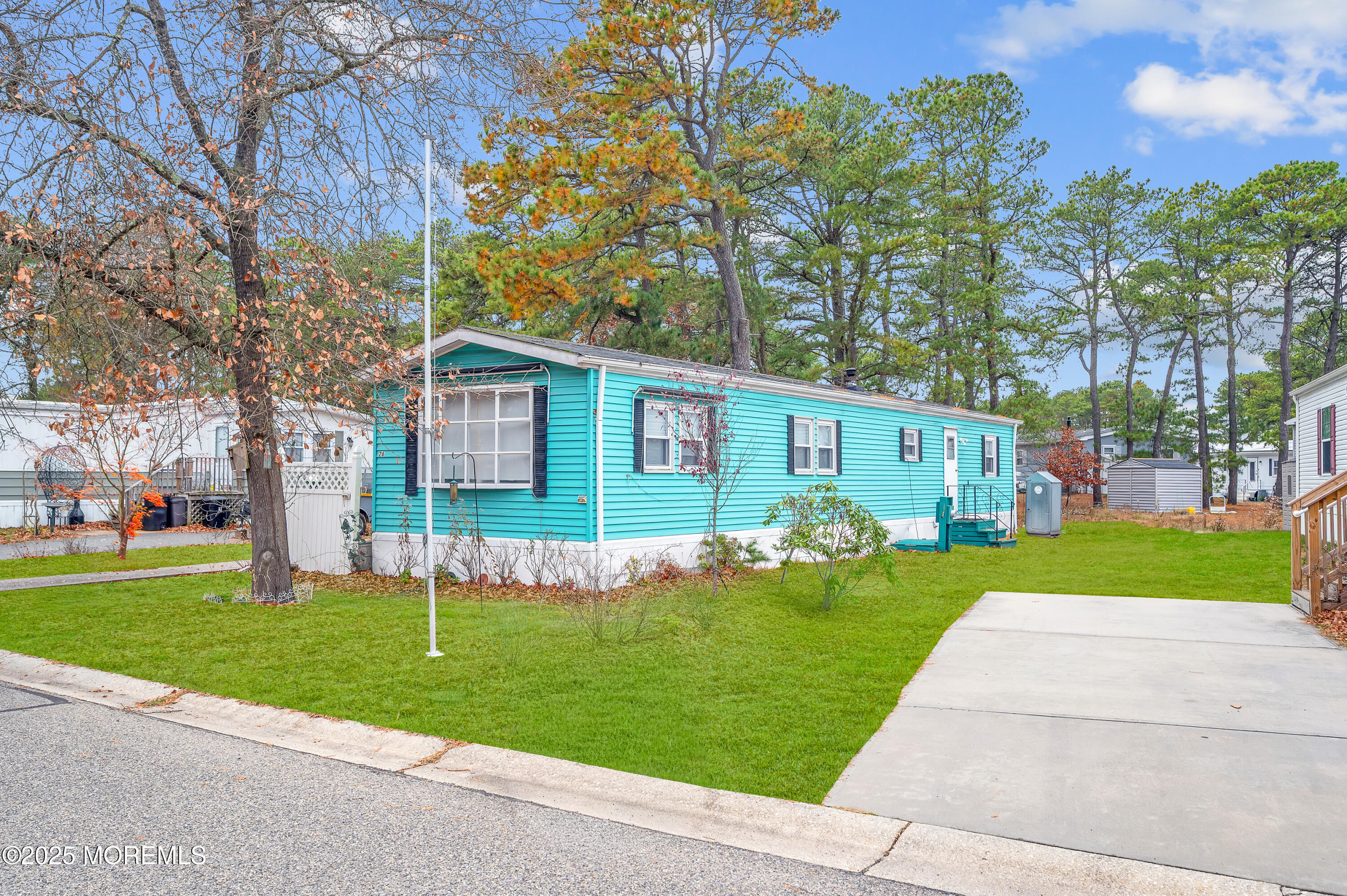 26 Raccoon Avenue Whiting, NJ 08759 - Photo 4 of 17 a view of a house with a yard