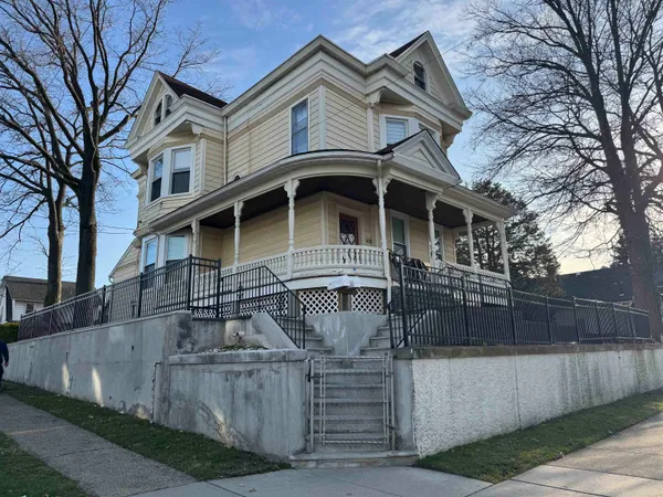 a front view of a house with garage