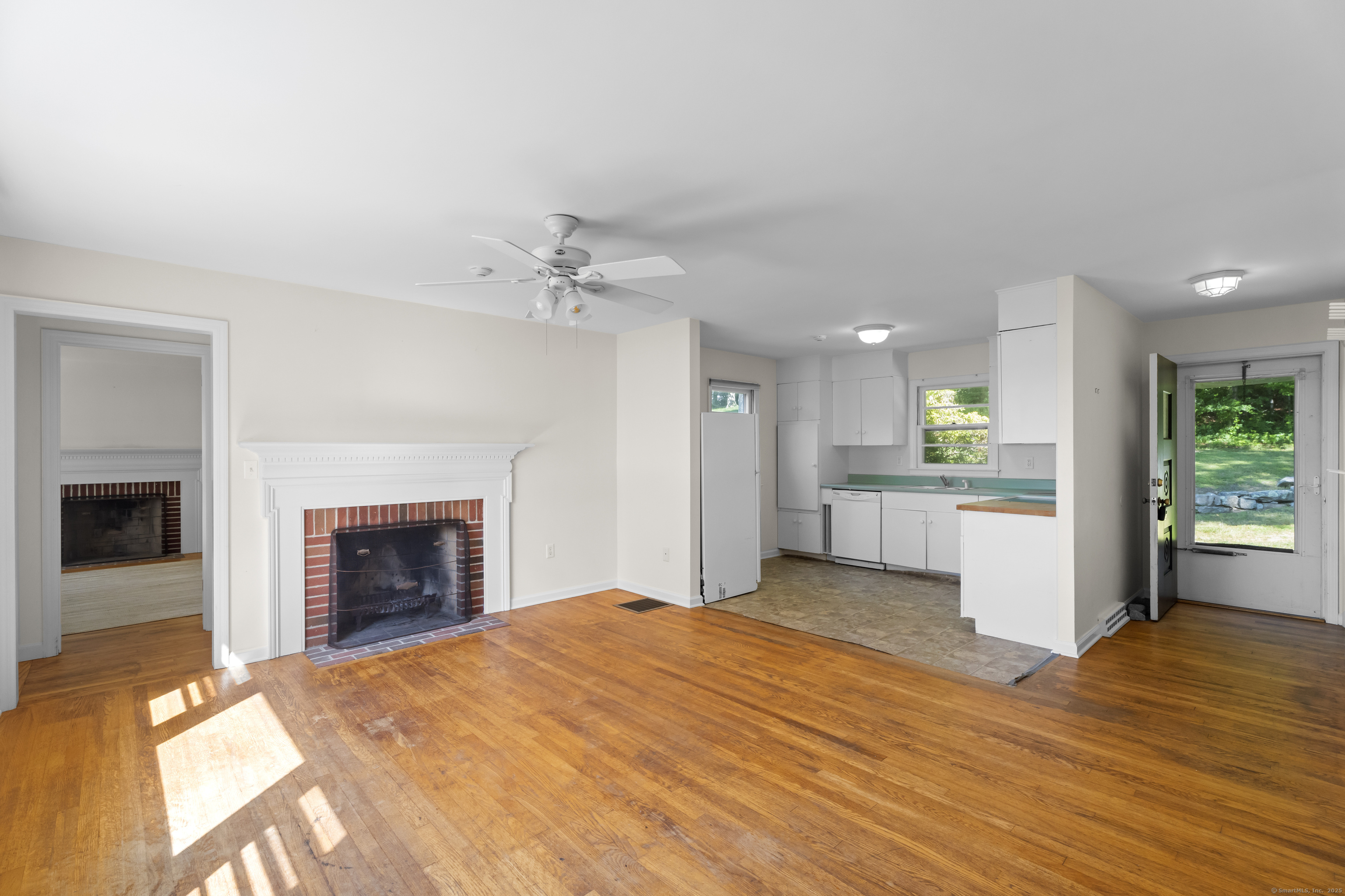 301 Osbrook Point Stonington, CT 06379 - Photo 11 of 39 a view of a livingroom with a fireplace