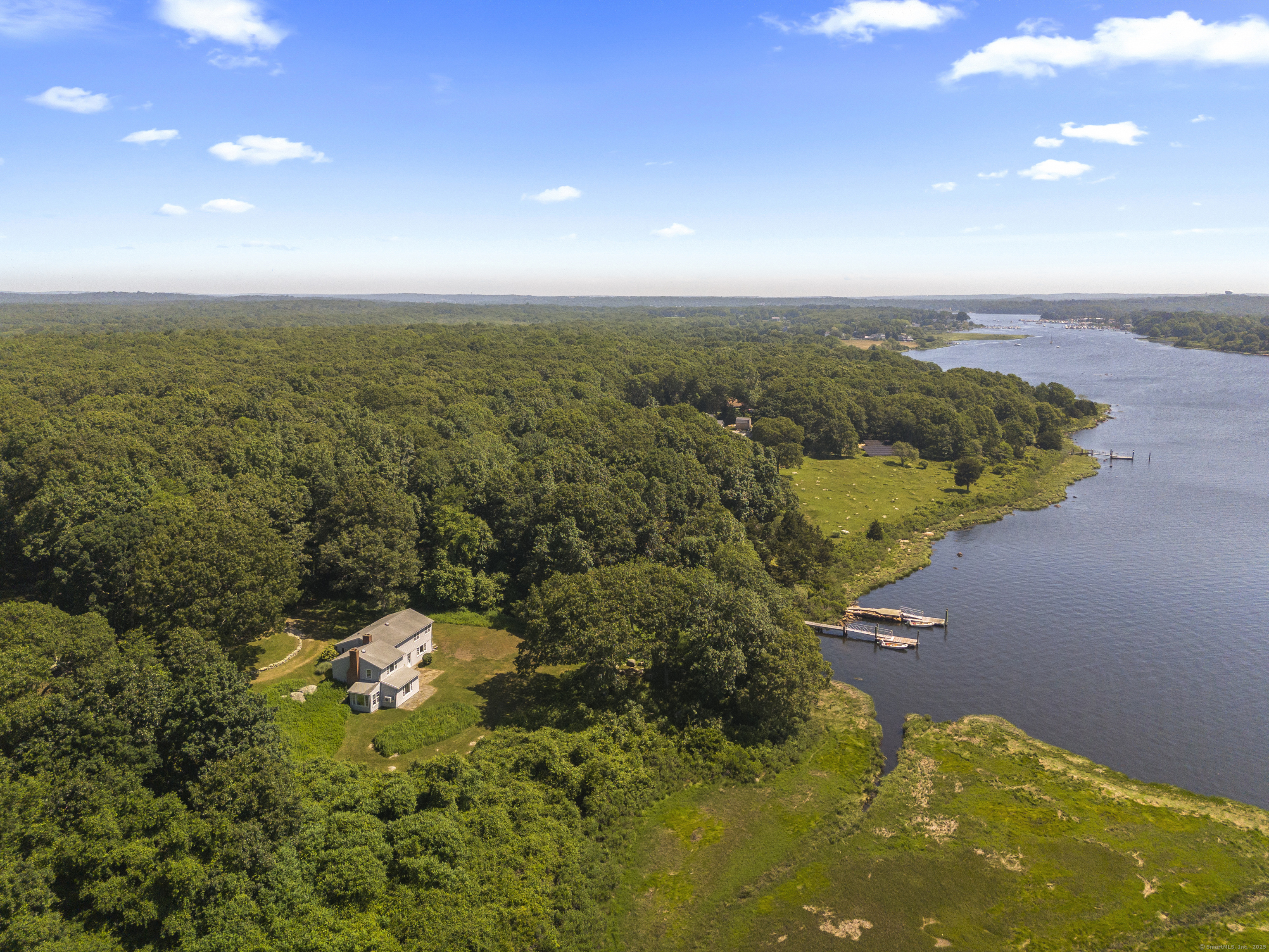 301 Osbrook Point Stonington, CT 06379 - Photo 35 of 39 a view of a lake with a mountain