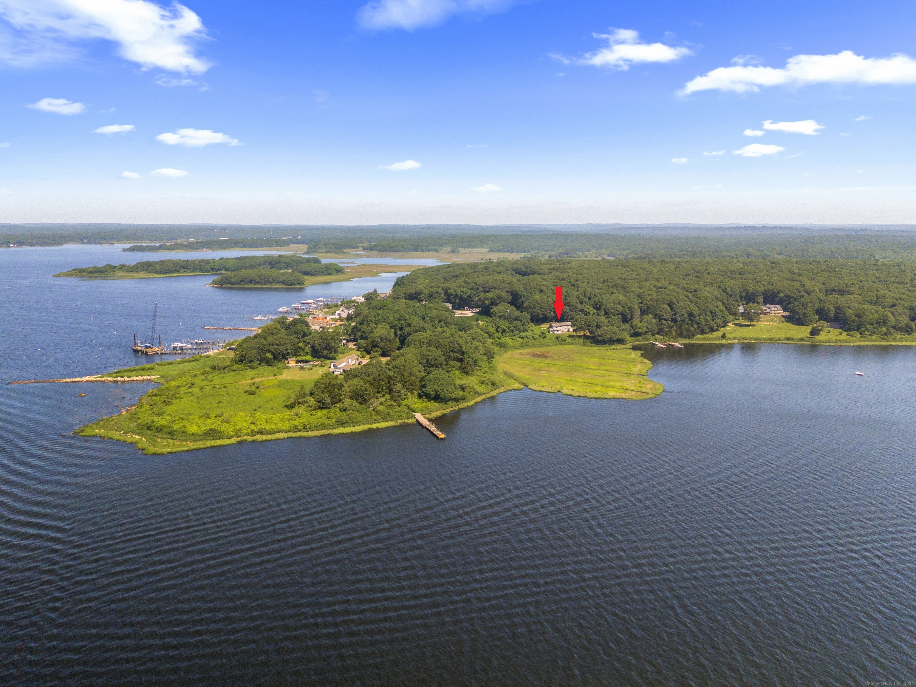 301 Osbrook Point Stonington, CT 06379 - Photo 6 of 39 a view of a swimming pool and an outdoor space