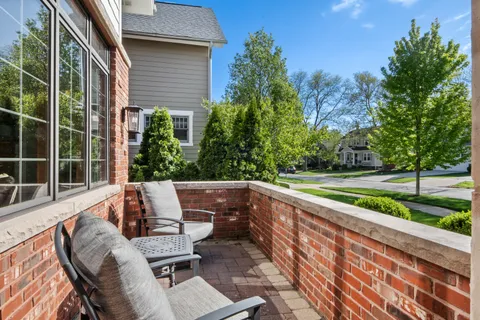 a porch with a trees in front of it
