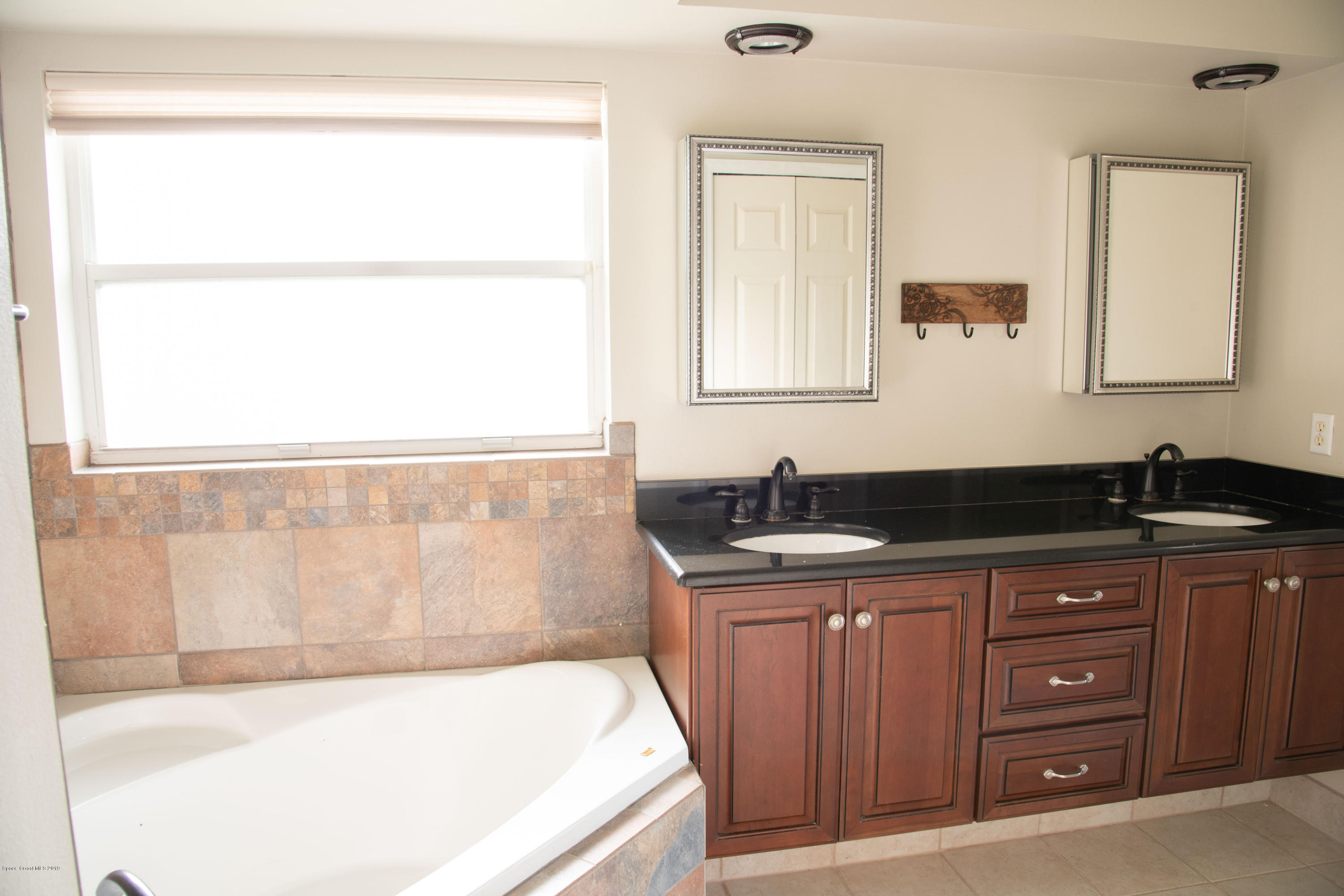 327 Lisa Road Northeast Palm Bay, FL 32907 - Photo 14 of 27 Master Bath