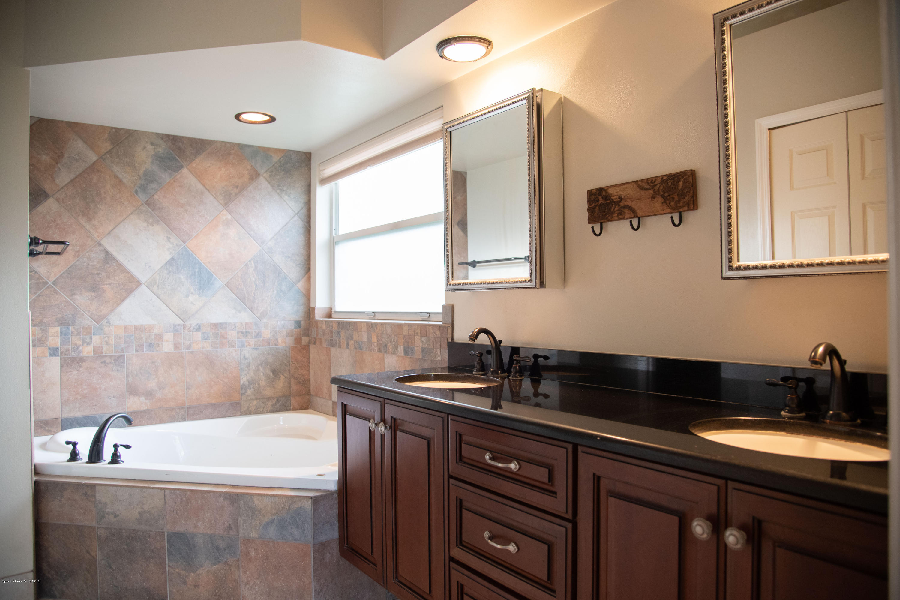327 Lisa Road Northeast Palm Bay, FL 32907 - Photo 15 of 27 Master Bath