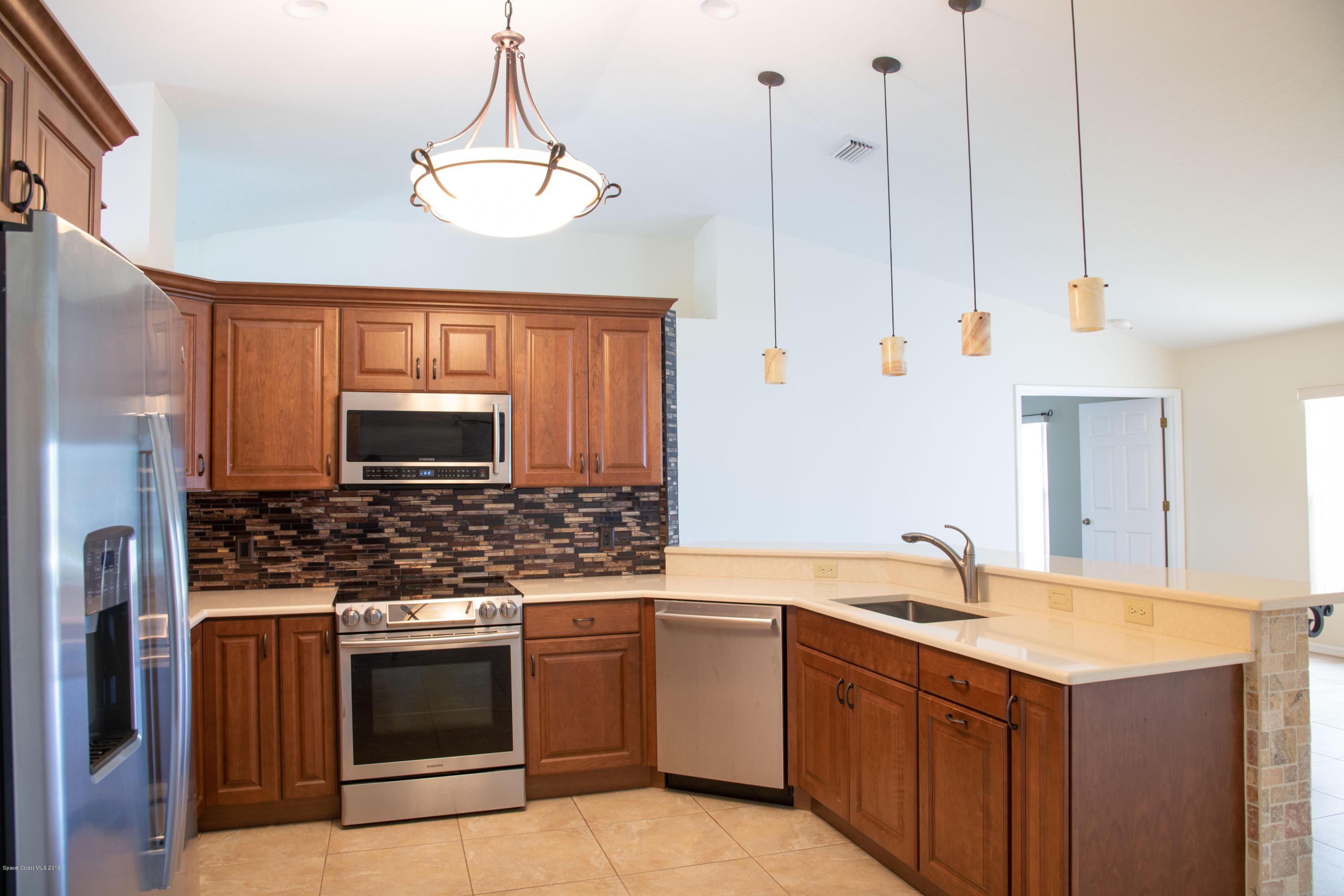327 Lisa Road Northeast Palm Bay, FL 32907 - Photo 3 of 27 Kitchen