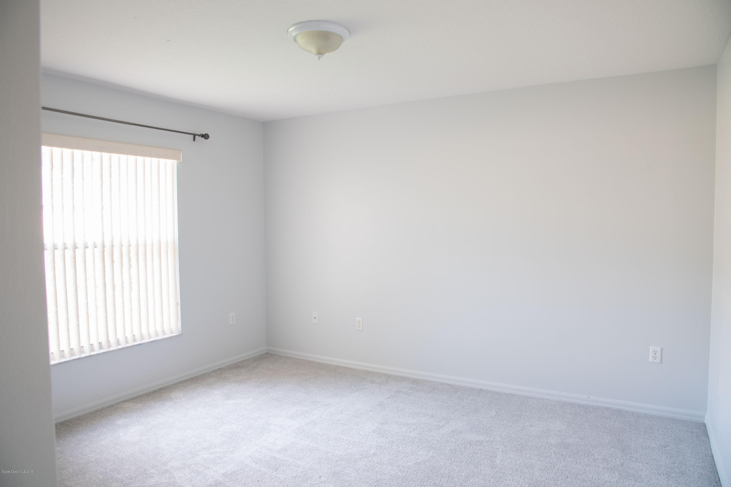 327 Lisa Road Northeast Palm Bay, FL 32907 - Photo 23 of 27 3rd Bedroom