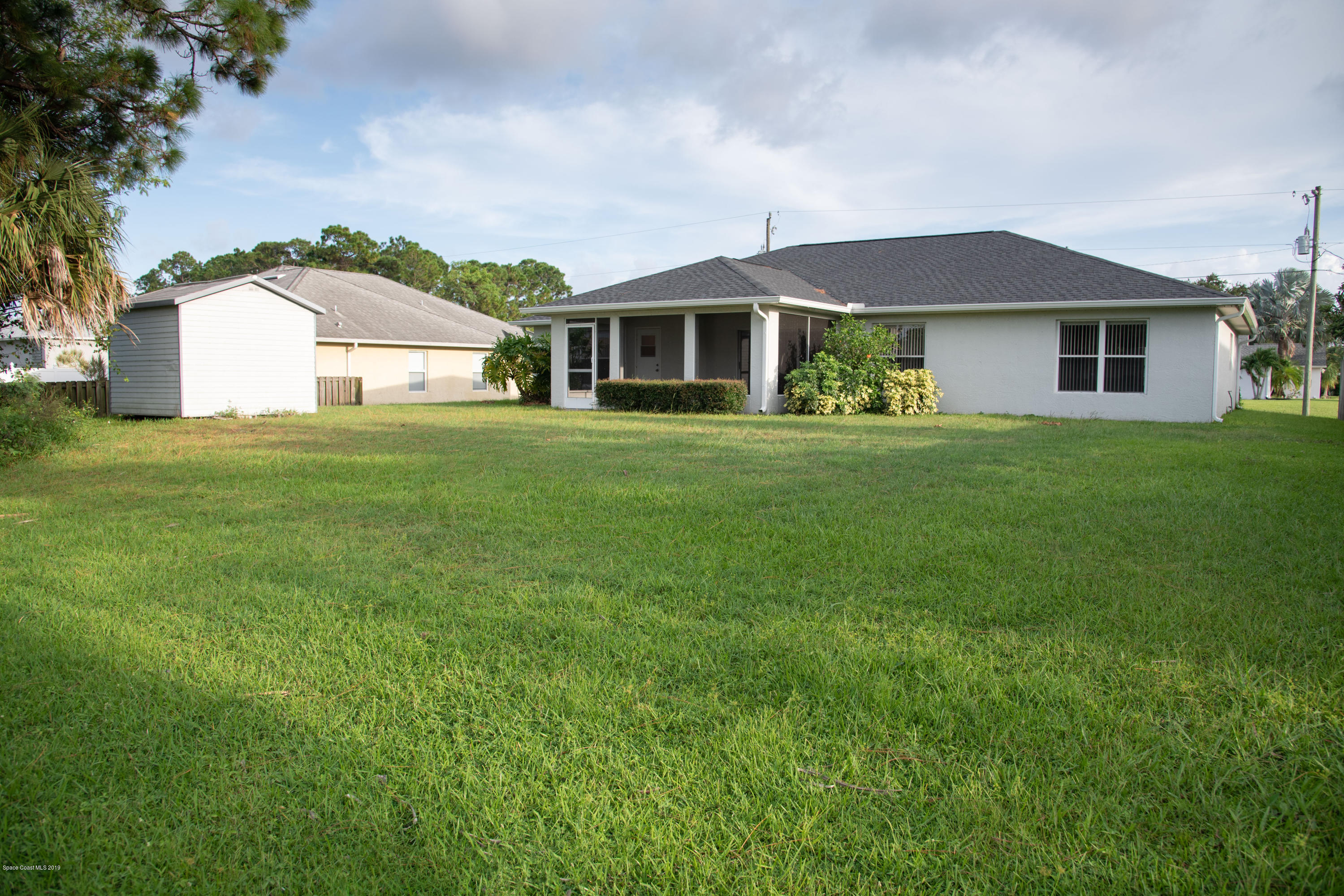 327 Lisa Road Northeast Palm Bay, FL 32907 - Photo 26 of 27 Back of Home