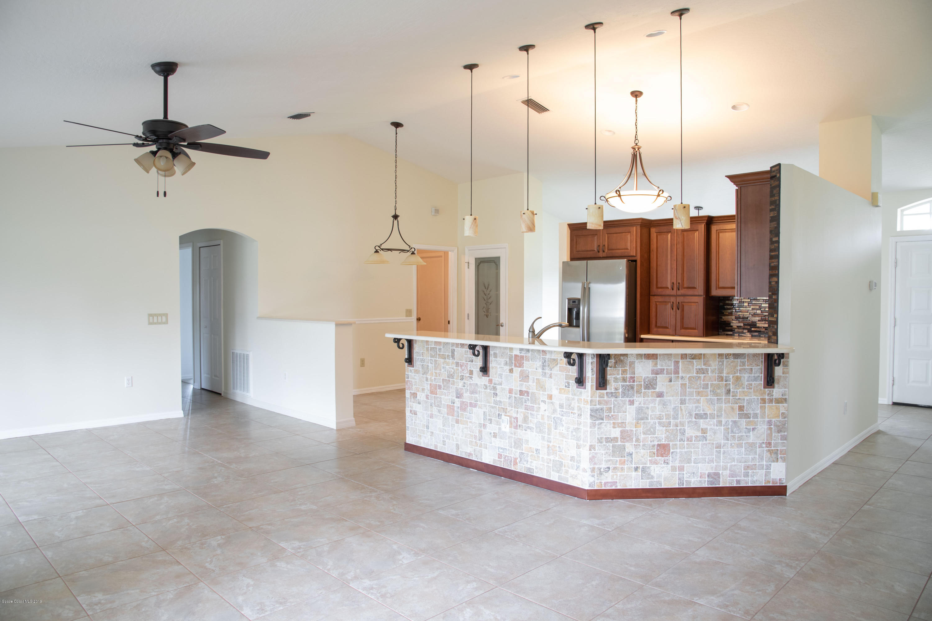 327 Lisa Road Northeast Palm Bay, FL 32907 - Photo 7 of 27 Great room