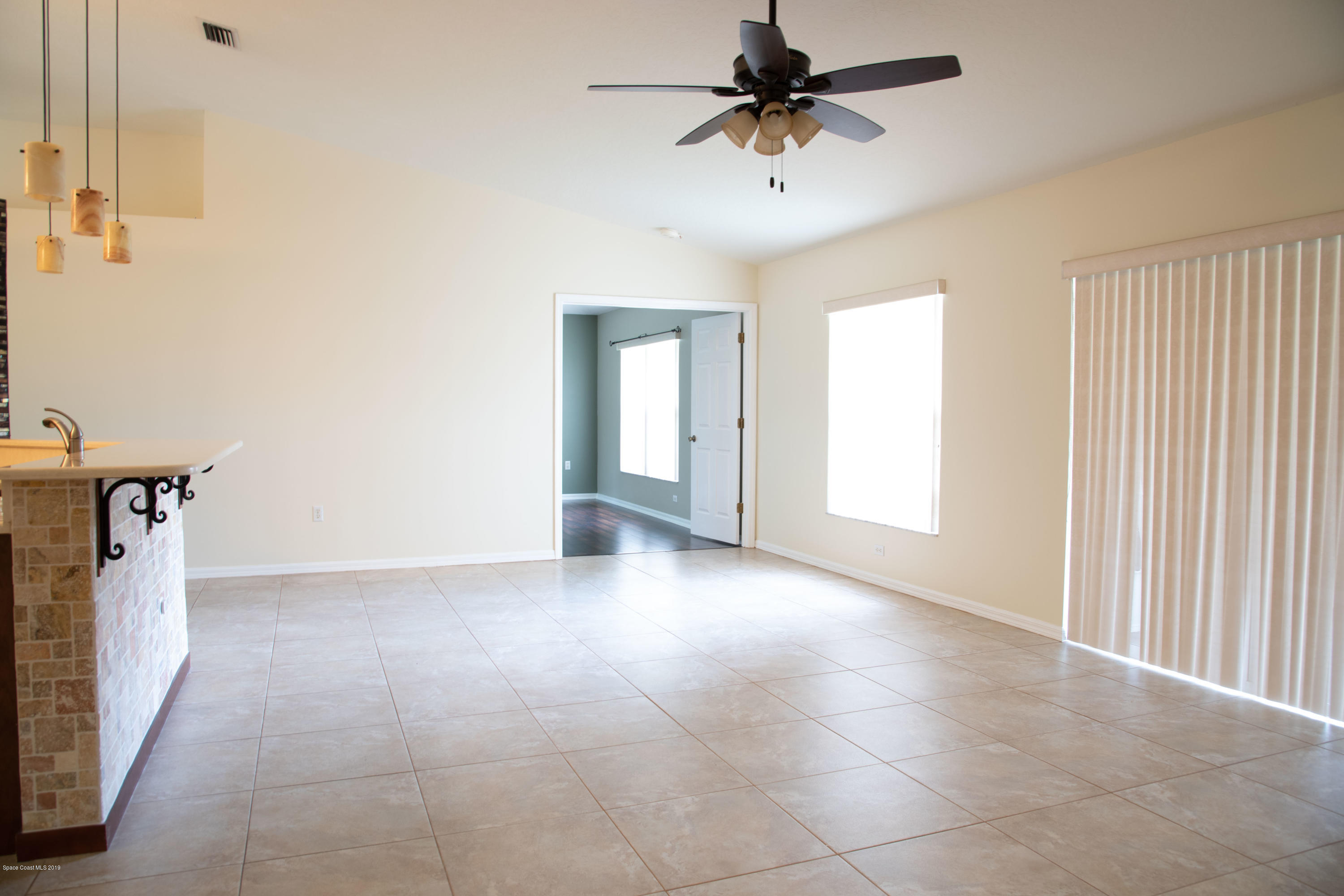 327 Lisa Road Northeast Palm Bay, FL 32907 - Photo 9 of 27 Great Room