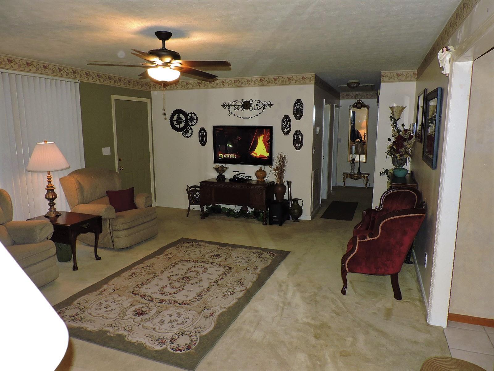 424 Goshen Road Lebanon, TN 37087 - Photo 15 of 29 a living room with furniture and a rug