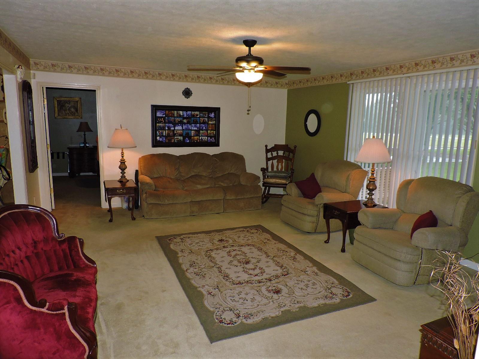 424 Goshen Road Lebanon, TN 37087 - Photo 17 of 29 a living room with furniture and a rug