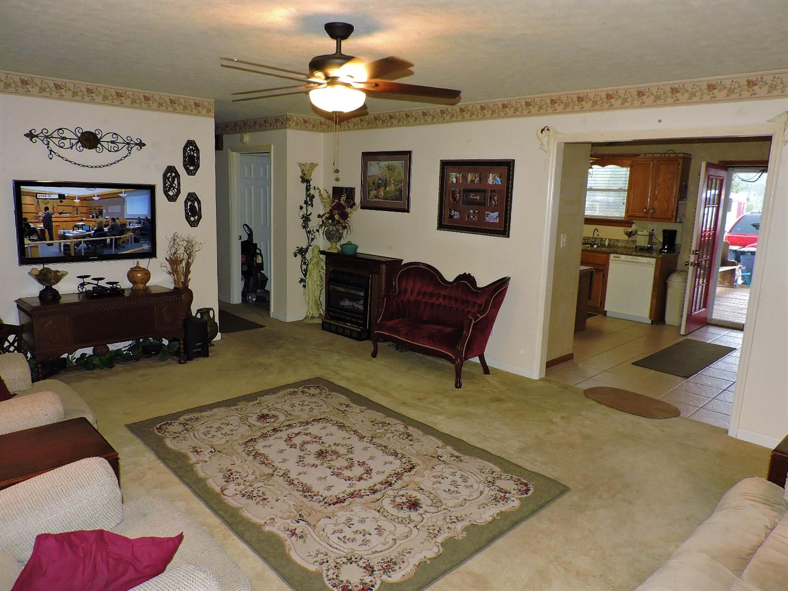 424 Goshen Road Lebanon, TN 37087 - Photo 18 of 29 a living room with furniture and a flat screen tv