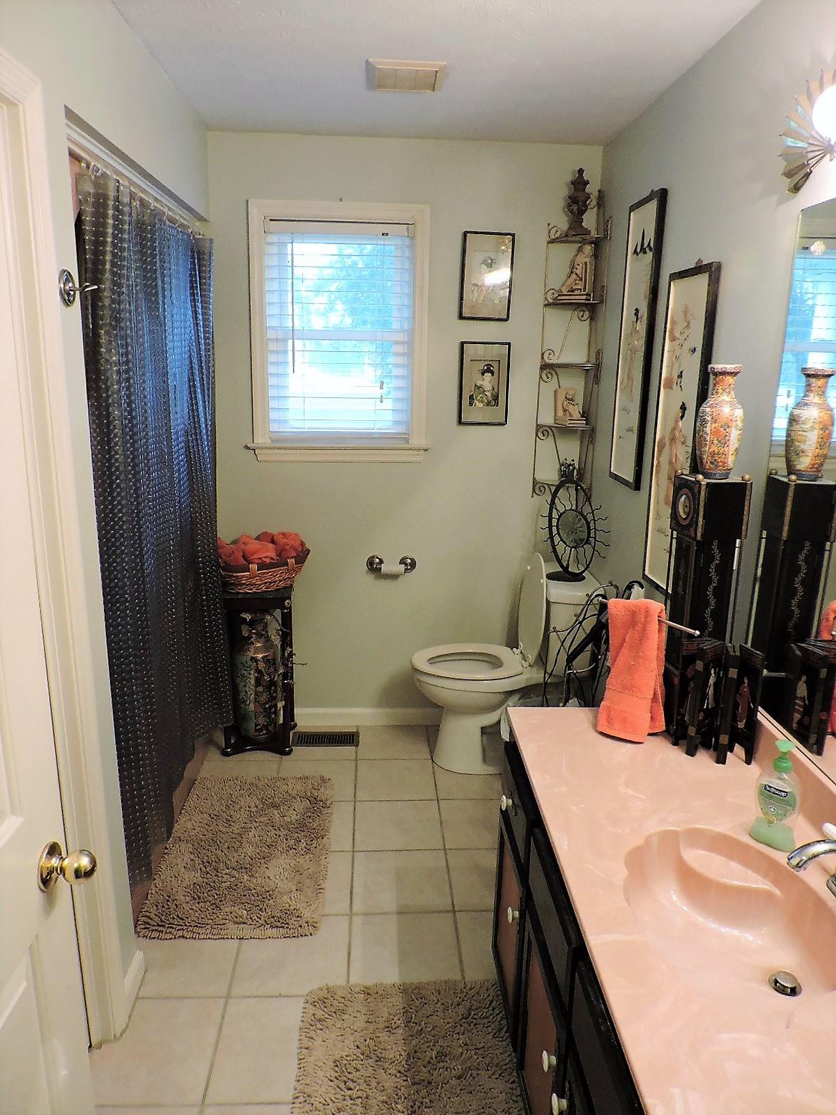 424 Goshen Road Lebanon, TN 37087 - Photo 25 of 29 a bathroom with a sink toilet and shower