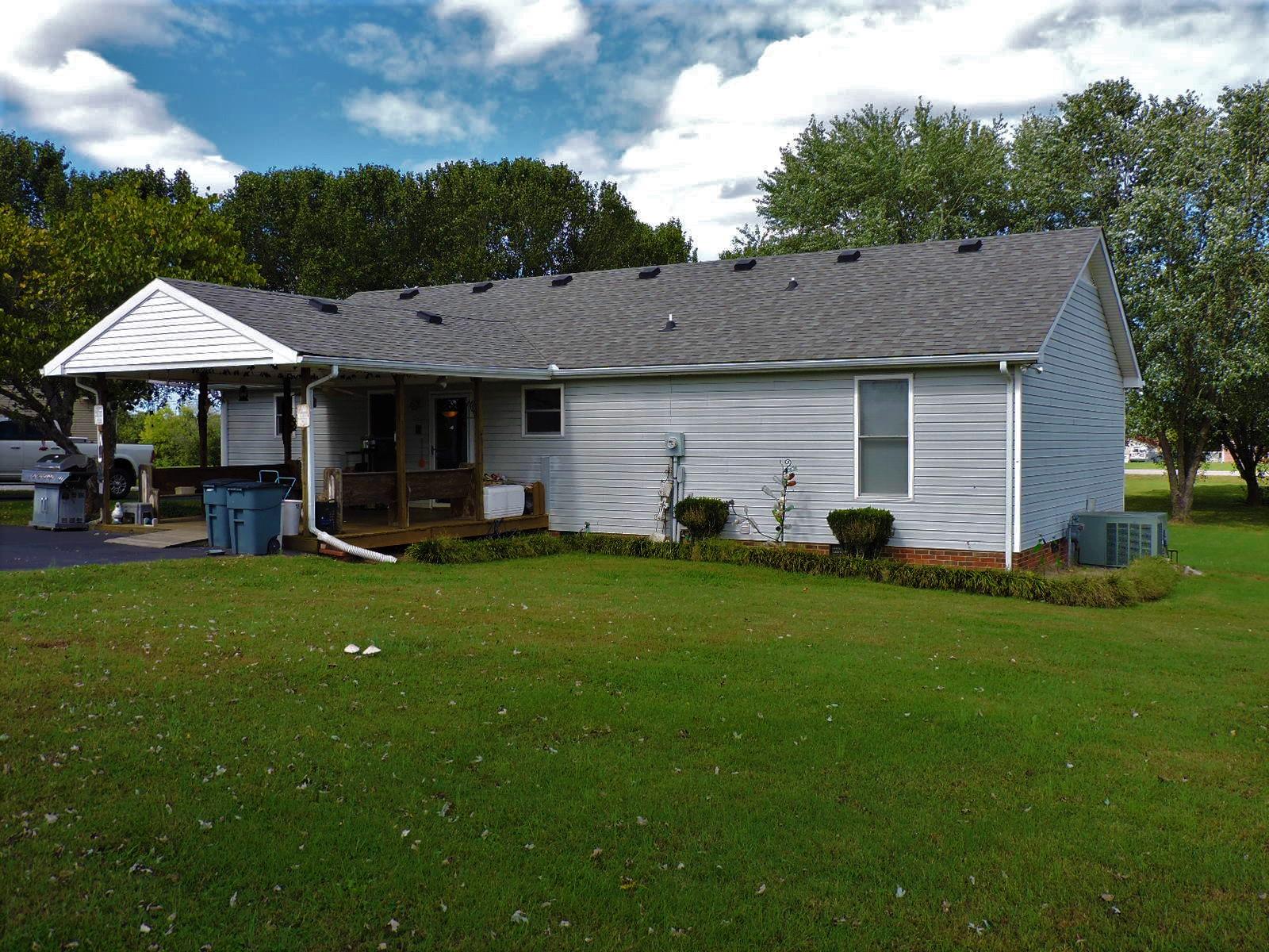 424 Goshen Road Lebanon, TN 37087 - Photo 7 of 29 a front view of house with yard and outdoor seating