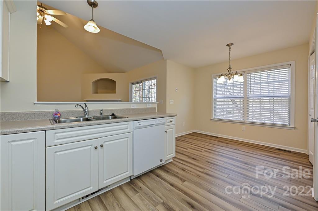 517 Kittiewake Lane Clover, SC 29710 - Photo 14 of 30 a spacious bathroom with double vanity and a mirror