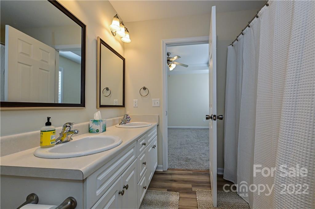 517 Kittiewake Lane Clover, SC 29710 - Photo 22 of 30 a bathroom with a sink and a mirror
