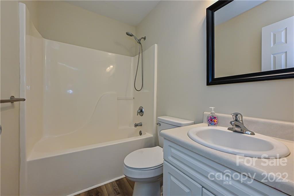 517 Kittiewake Lane Clover, SC 29710 - Photo 25 of 30 a bathroom with a sink toilet and shower