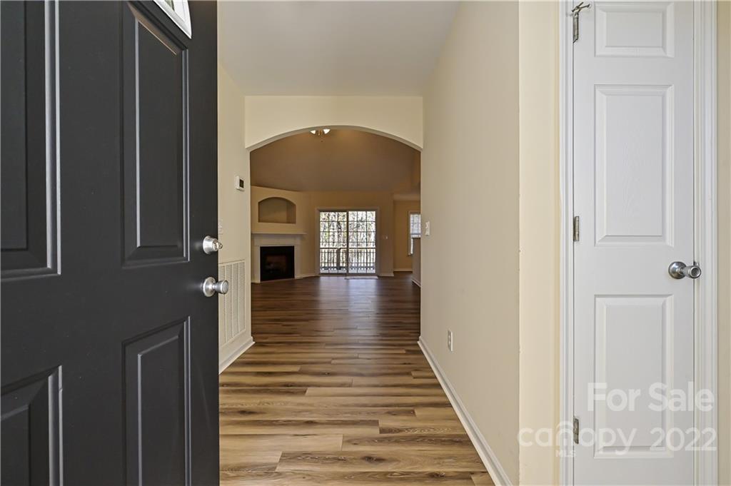 517 Kittiewake Lane Clover, SC 29710 - Photo 6 of 30 a view of a hallway with wooden floor and staircase