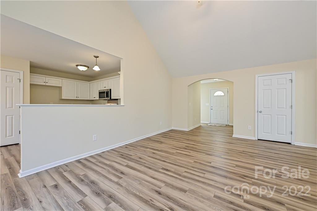 517 Kittiewake Lane Clover, SC 29710 - Photo 9 of 30 a view of empty room with wooden floor