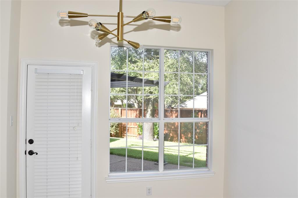 7201 Regency Court Plano, TX 75024 - Photo 16 of 37 Breakfast area open to backyard
