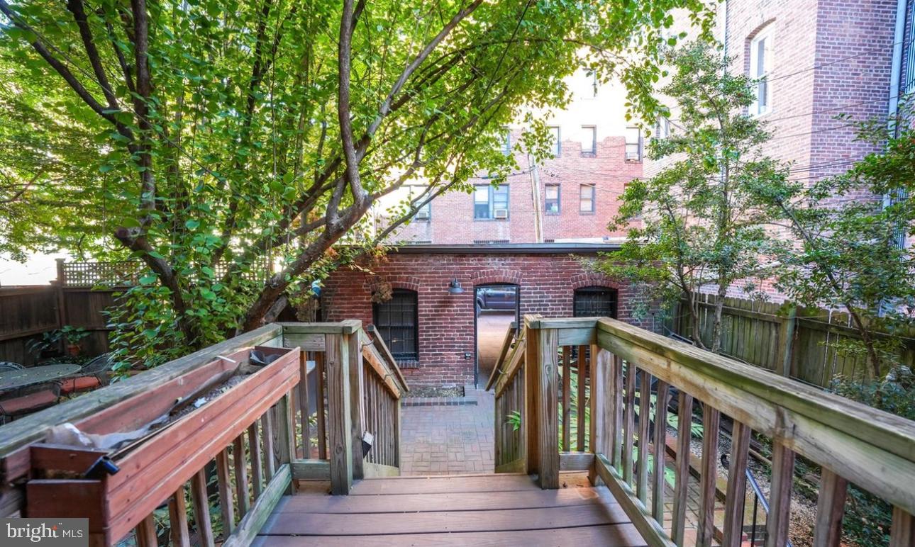 1703 Q Street Northwest Washington, DC 20009 - Photo 4 of 4 a view of house with outdoor space and lake view