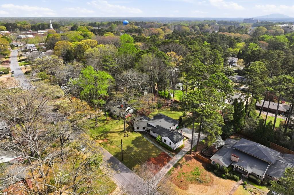 864 Stratford Road Avondale Estates, GA 30002 - Photo 41 of 54 a view of a city with lush green forest