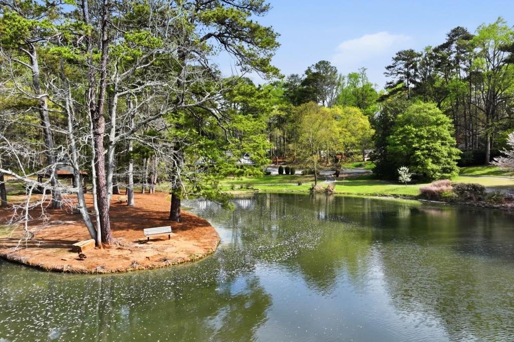 864 Stratford Road Avondale Estates, GA 30002 - Photo 45 of 54 a view of a lake with a house