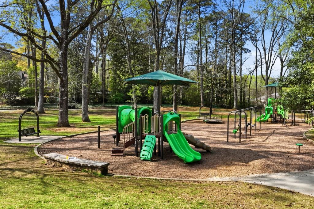 864 Stratford Road Avondale Estates, GA 30002 - Photo 49 of 54 a view of a park with slide