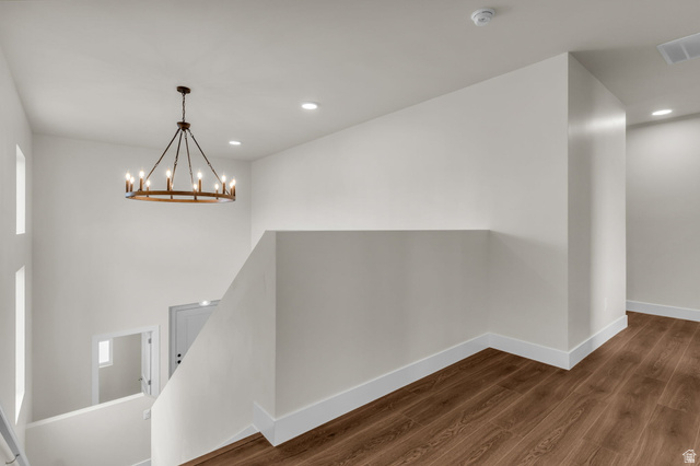 576 7th Avenue Midvale, UT 84047 - Photo 9 of 32 Hall featuring dark wood-type flooring and hanging lights