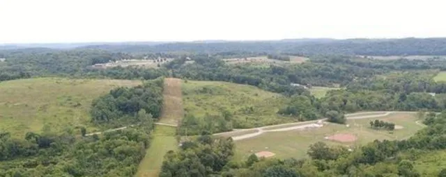 a view of a lake in middle of the town