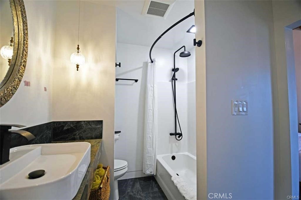 117 Kenneth Street Camarillo, CA 93010 - Photo 10 of 10 a bathroom with a tub a sink and a shower