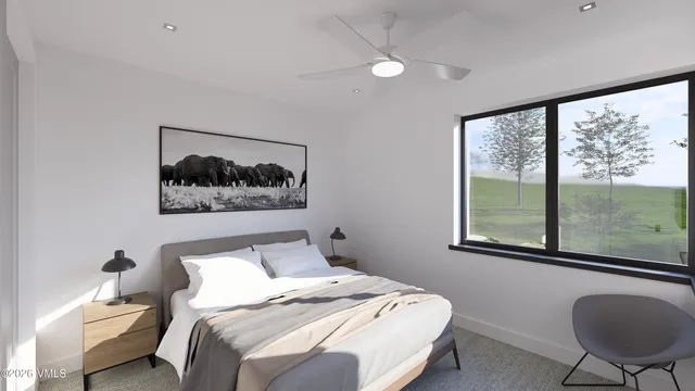 a view of a big yard with table and chairs