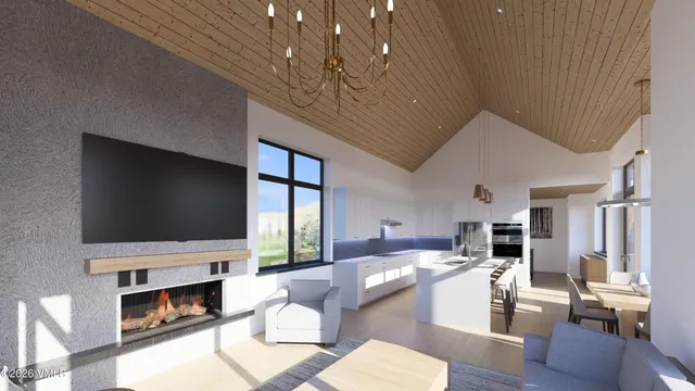 a kitchen with stainless steel appliances granite countertop a sink and a stove