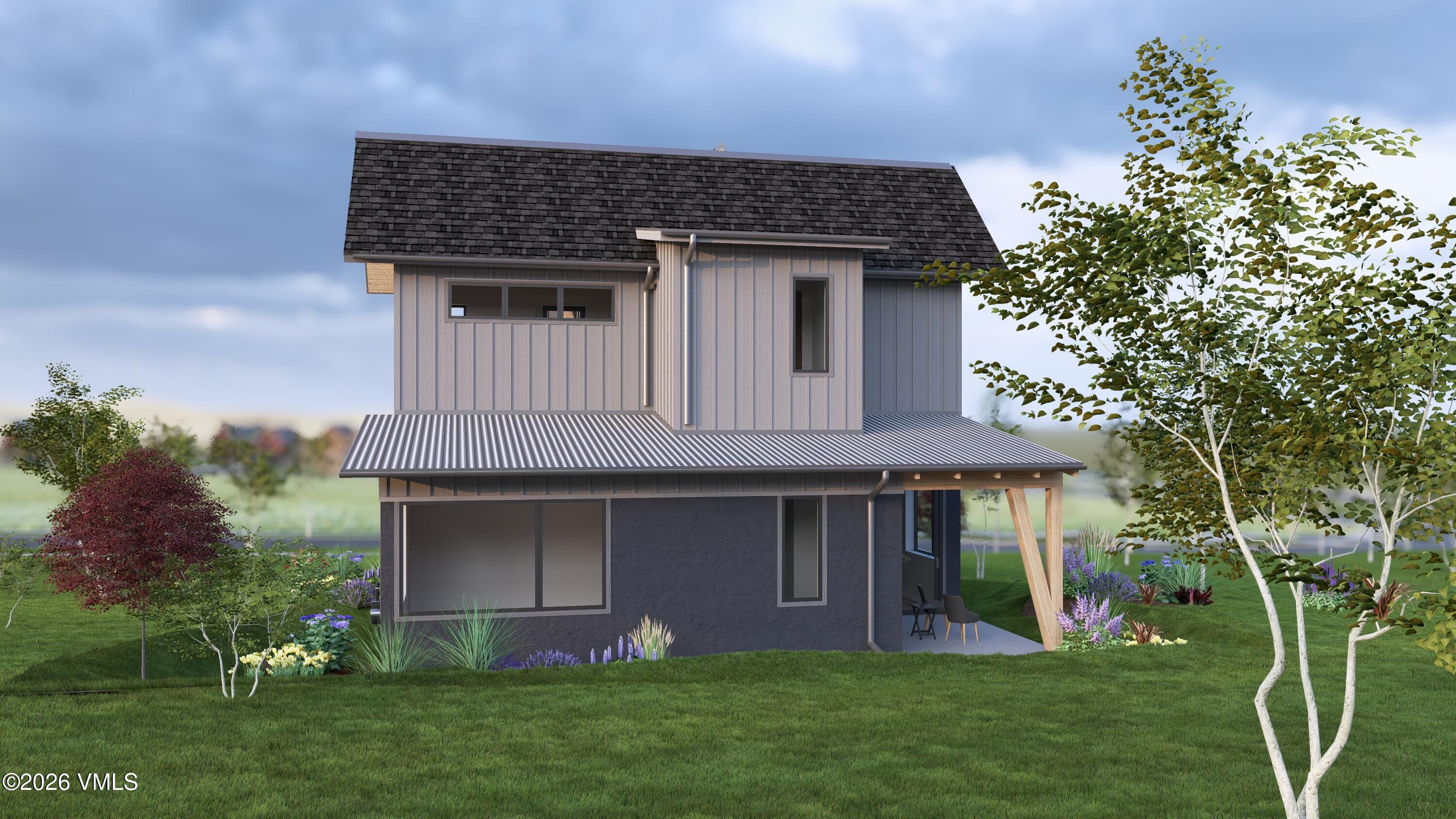 229 Mount Hope Circle Eagle, CO 81631 - Photo 7 of 35 a front view of a house with a garden and plants