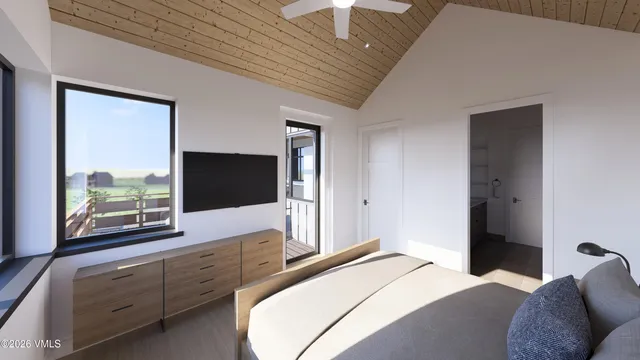 a view of entryway with wooden floor and a potted plant