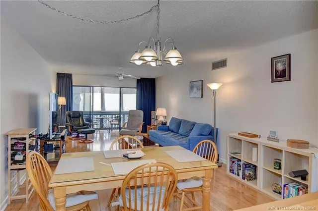 a view of a livingroom and dining room