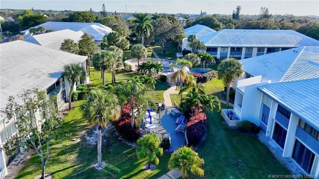 a view of an outdoor space pool patio and lake view