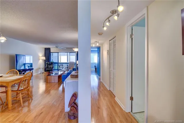 a view of a living room and dining room
