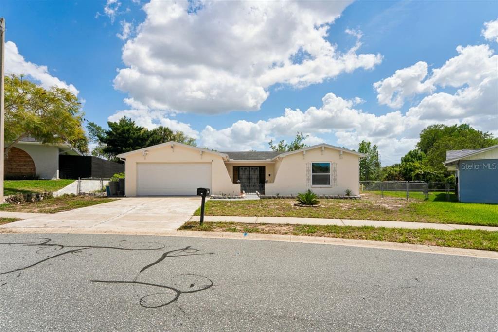 6955 Bottle Brush Drive Port Richey, FL 34668 - Photo 2 of 61 a view of backyard of house
